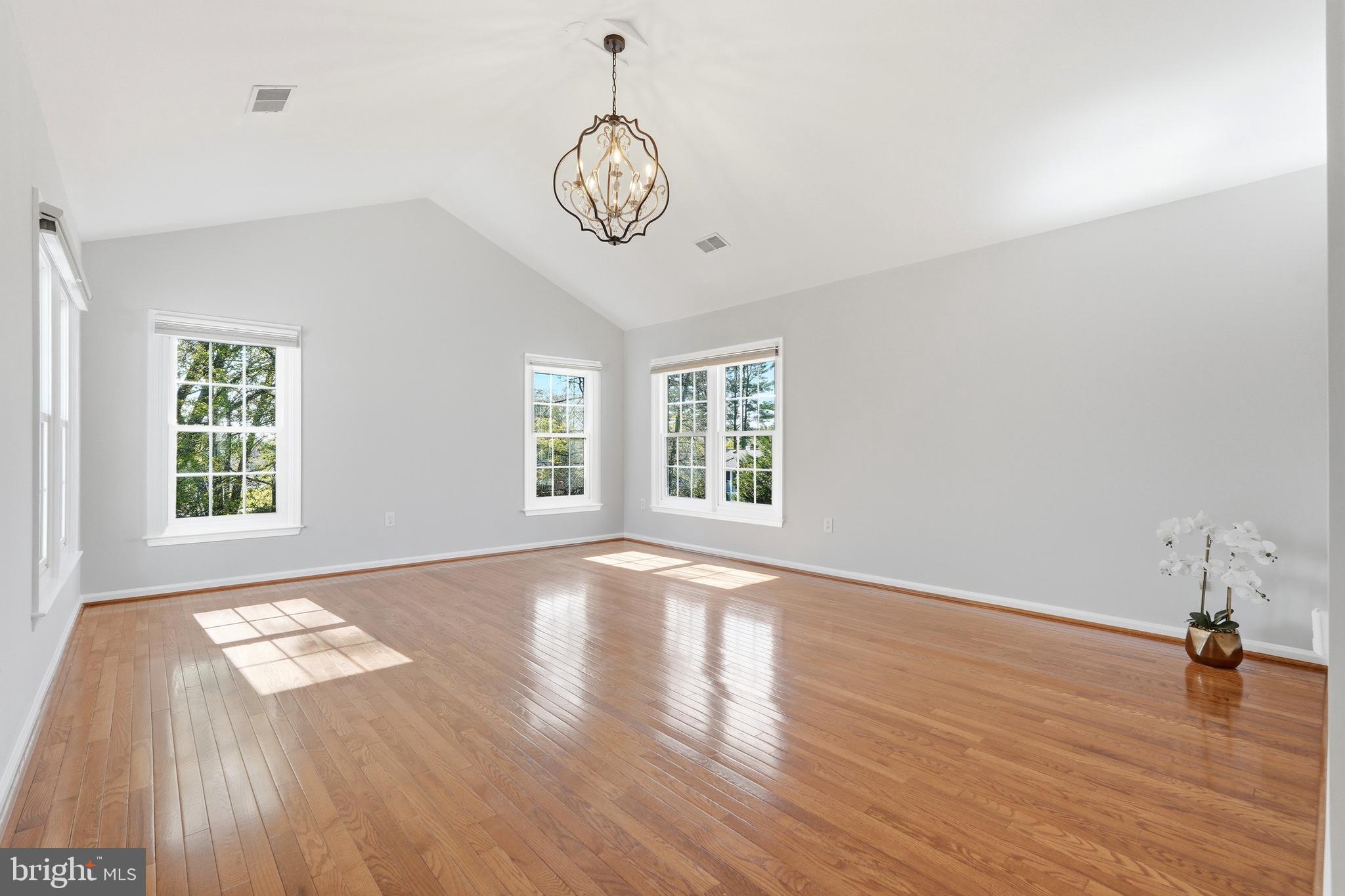 3714 Monitor Place Olney, MD 20832 - Photo 23 of 49 an empty room with wooden floor and windows