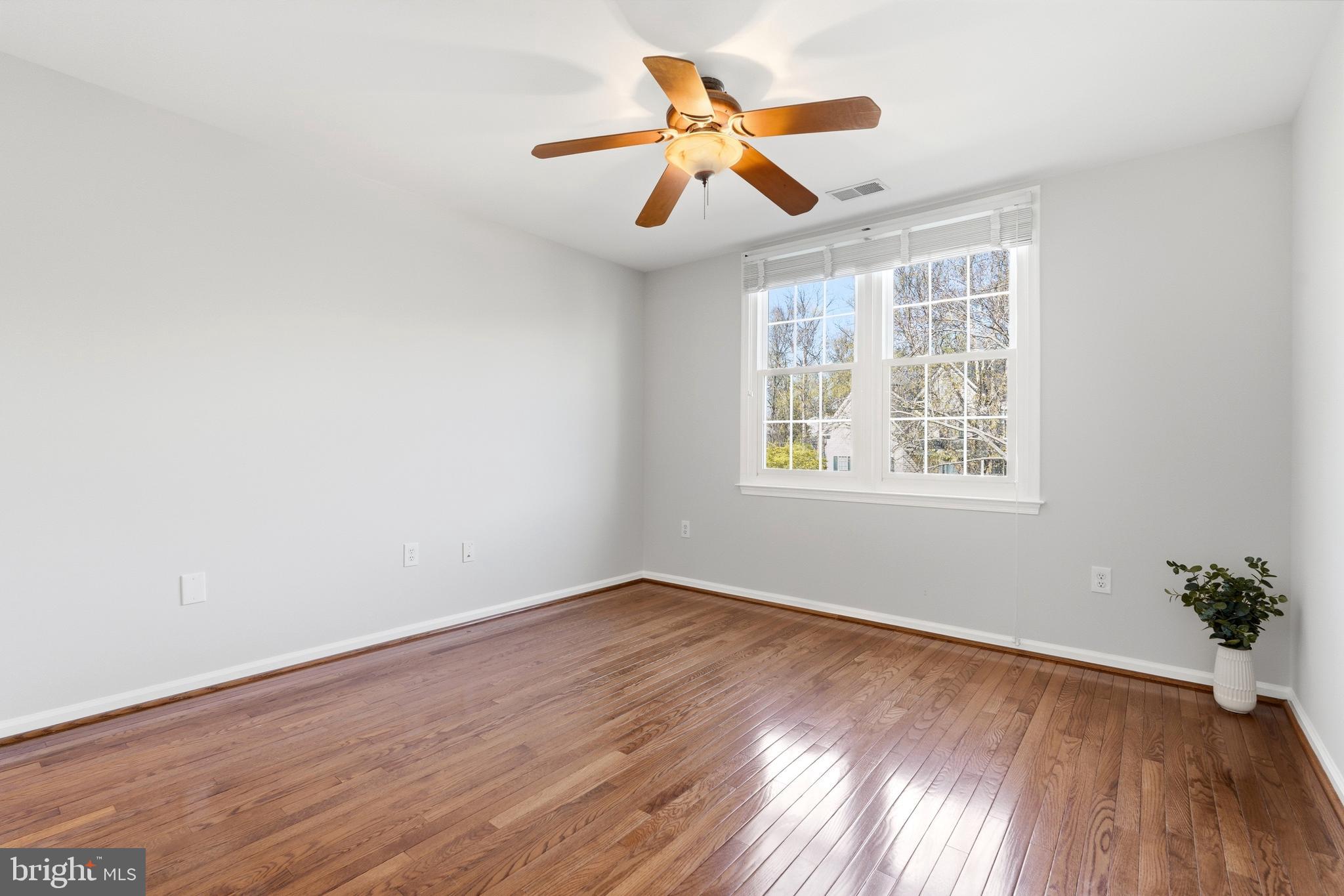 3714 Monitor Place Olney, MD 20832 - Photo 26 of 49 a view of room with wooden floor and windows