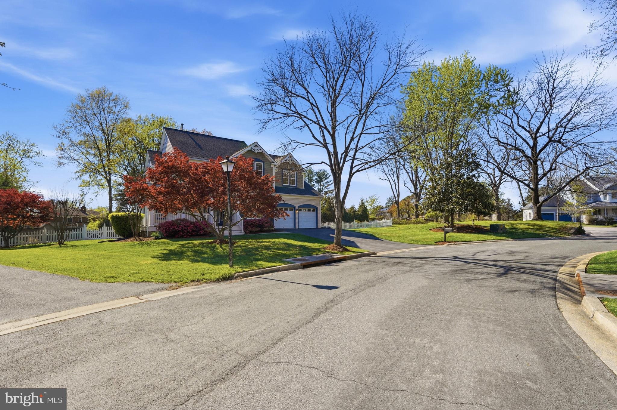 3714 Monitor Place Olney, MD 20832 - Photo 3 of 49 a view of a house with a big yard and large trees