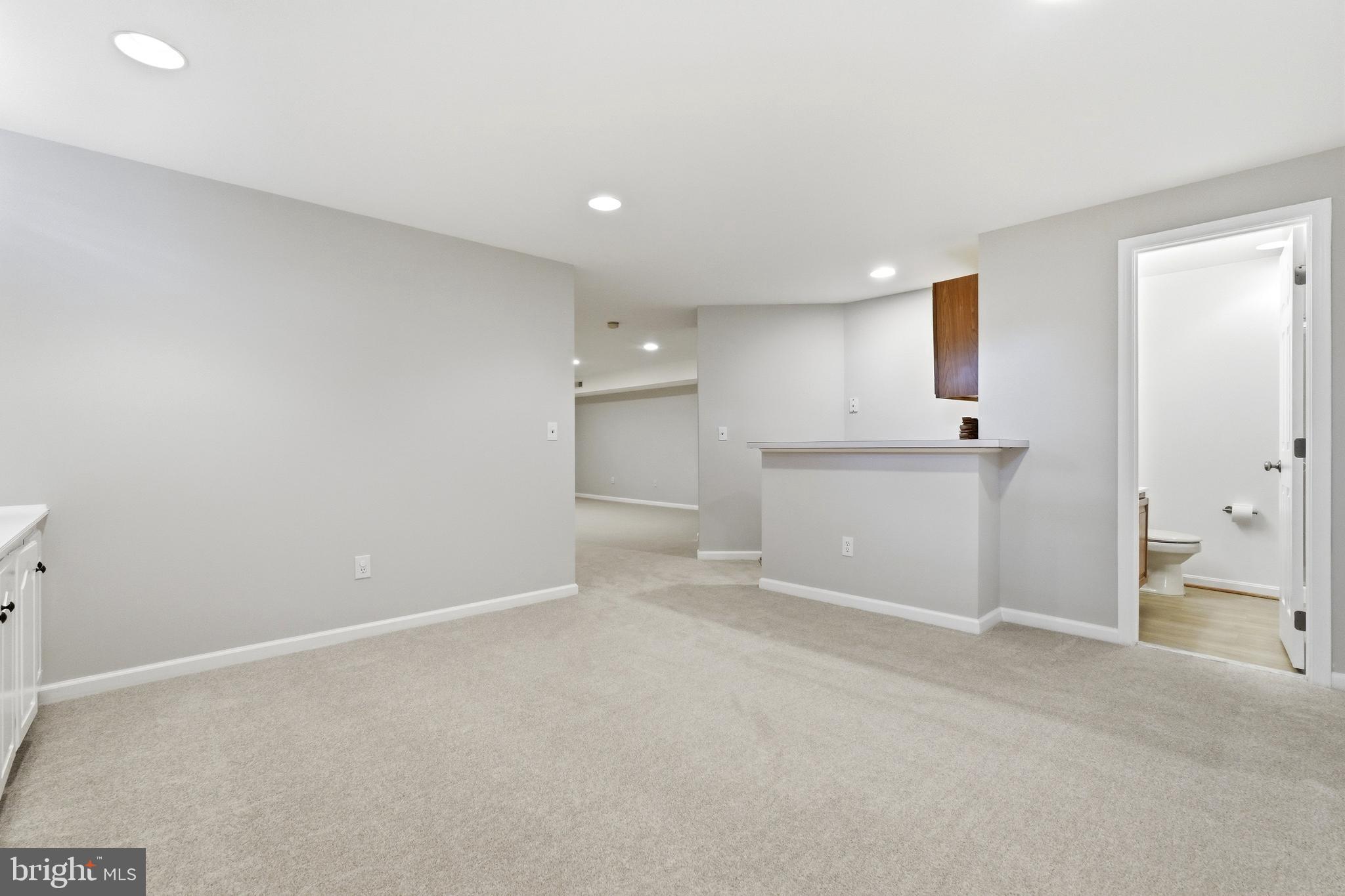 3714 Monitor Place Olney, MD 20832 - Photo 38 of 49 a view of an empty room with a kitchen