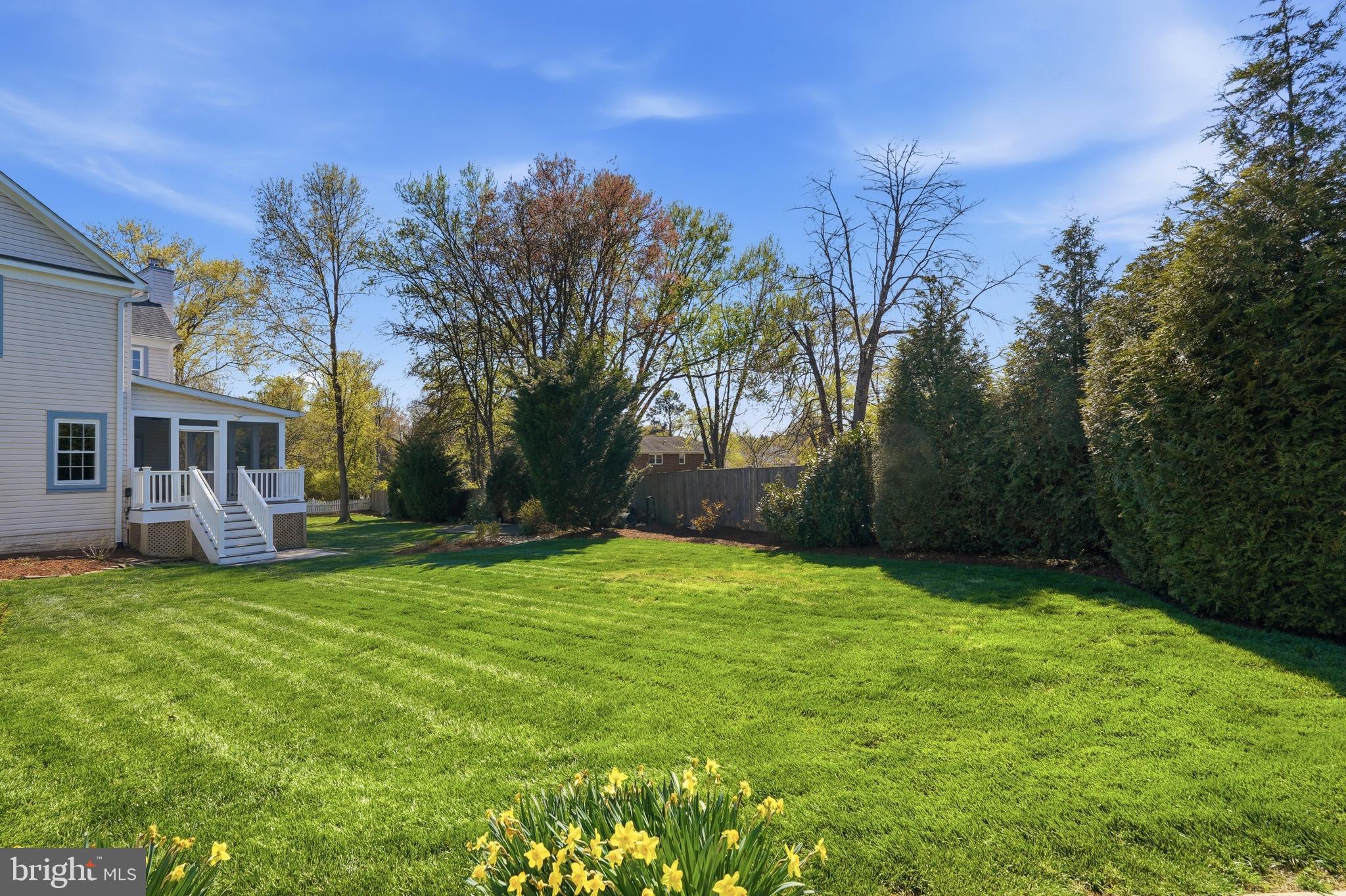 3714 Monitor Place Olney, MD 20832 - Photo 45 of 49 a backyard of a house with table and chairs