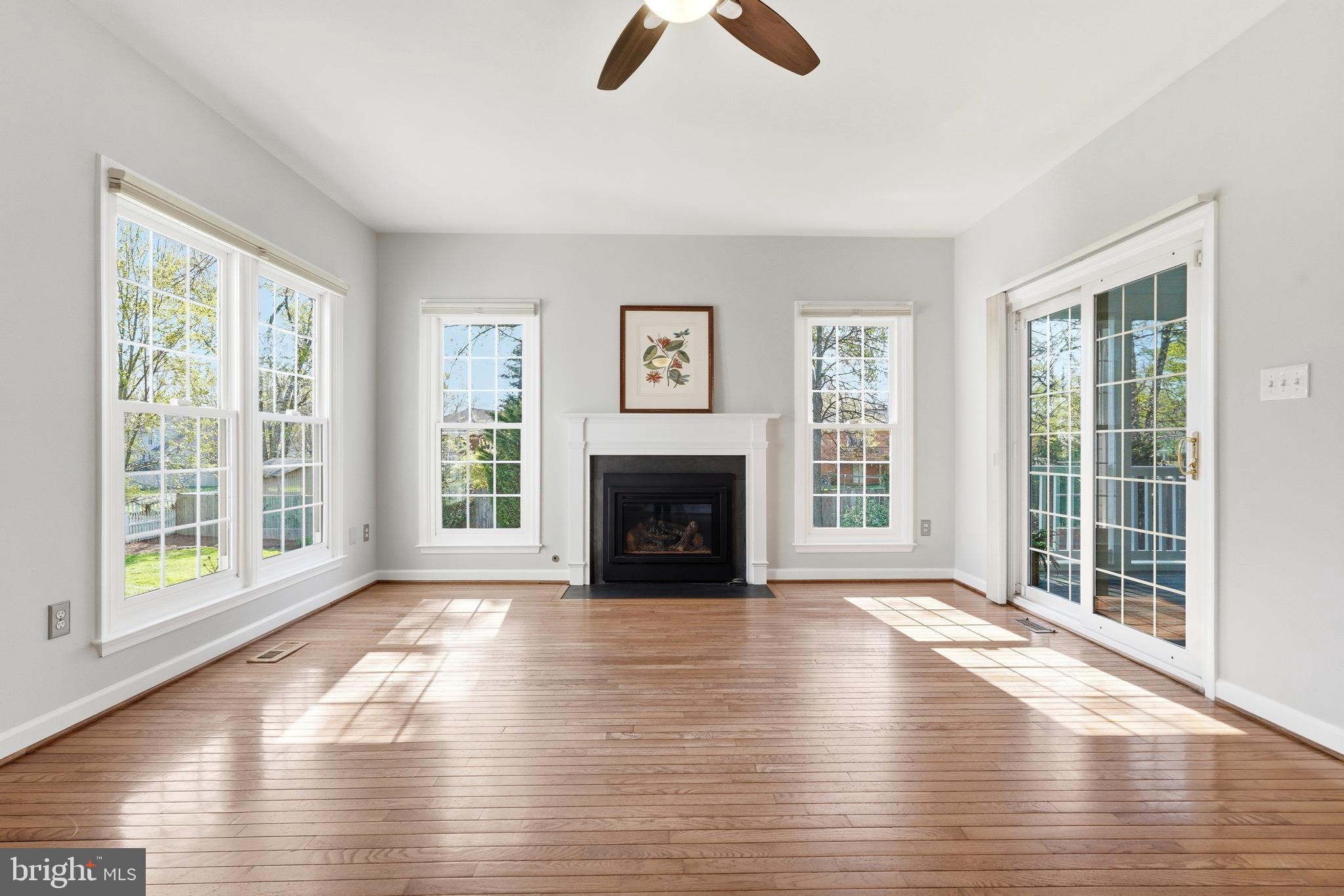 3714 Monitor Place Olney, MD 20832 - Photo 10 of 49 a view of an empty room with wooden floor and a window