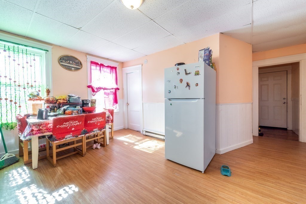 217 Beacon Street Worcester, MA 01610 - Photo 28 of 39 a bedroom with furniture and a window