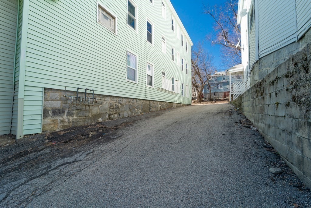 217 Beacon Street Worcester, MA 01610 - Photo 38 of 39 a view of a street with a house