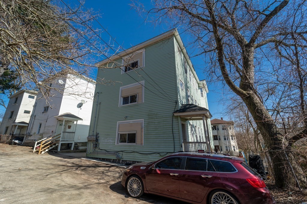 217 Beacon Street Worcester, MA 01610 - Photo 39 of 39 a view of a car parked in front of a house