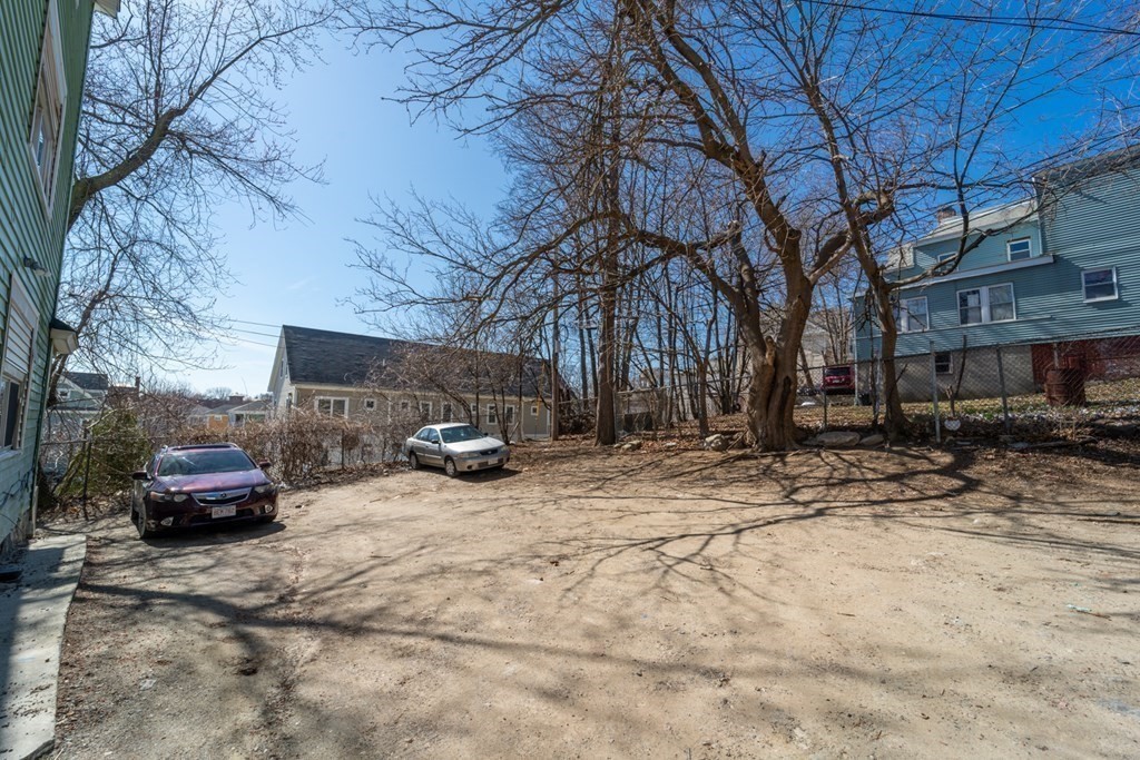 217 Beacon Street Worcester, MA 01610 - Photo 4 of 39 a view of street with parked cars