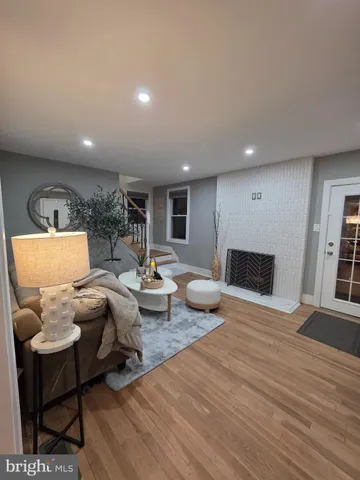 a room with furniture and a mirror