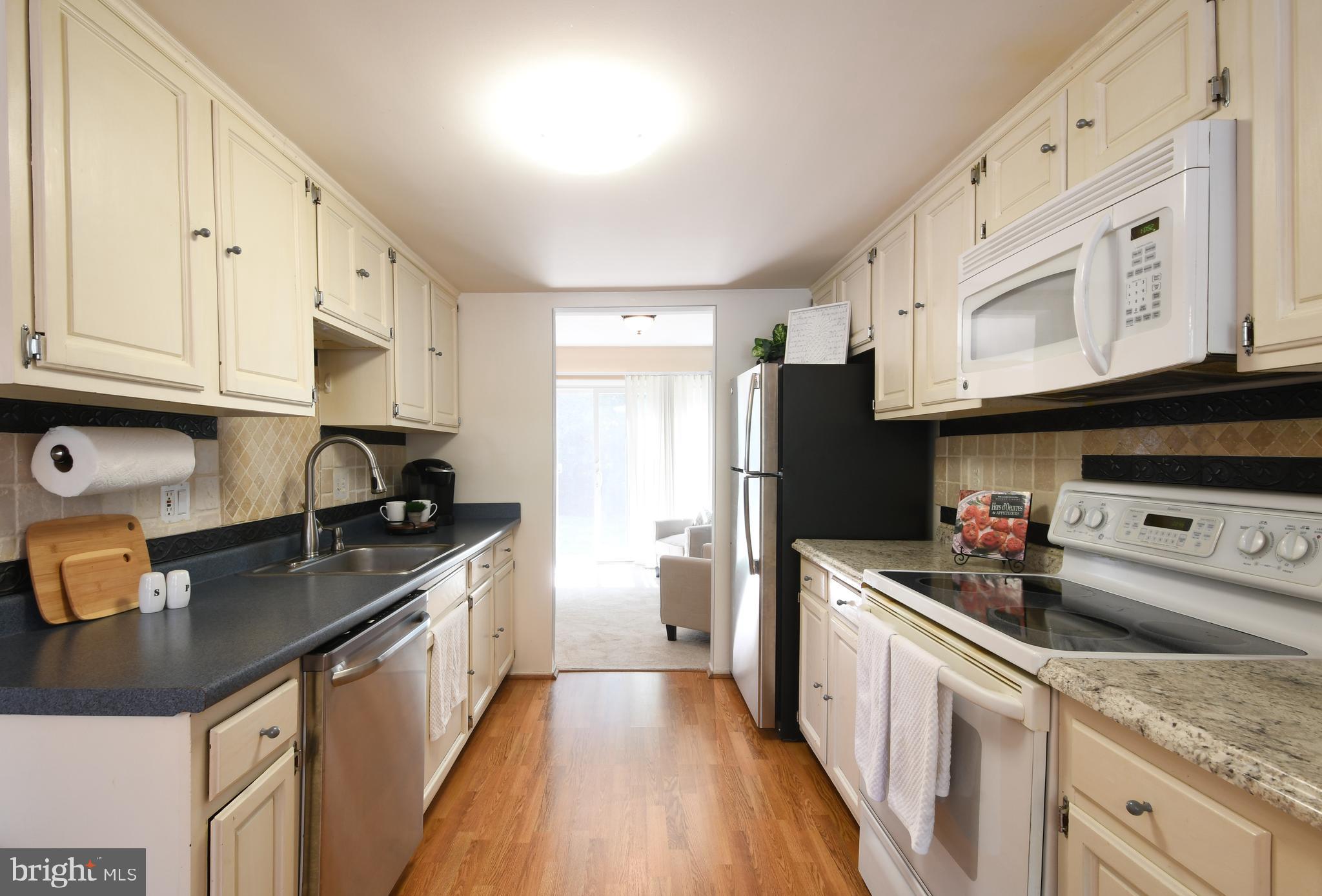 8523 Jenner Court Springfield, VA 22153 - Photo 6 of 41 Crisp white cabinetry