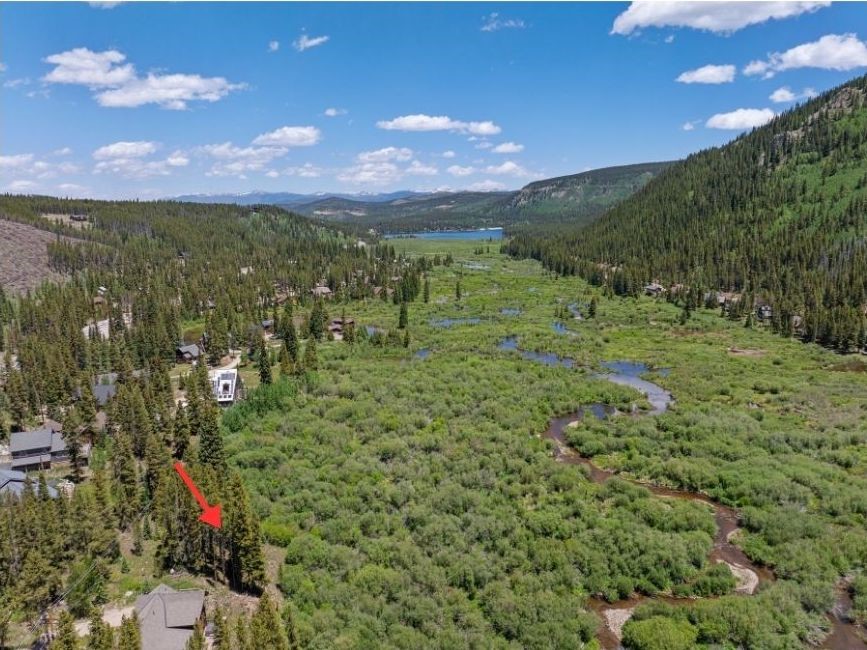 16 Rustic Terrace Breckenridge, CO 80424 - Photo 3 of 15 a view of a lake with a mountain