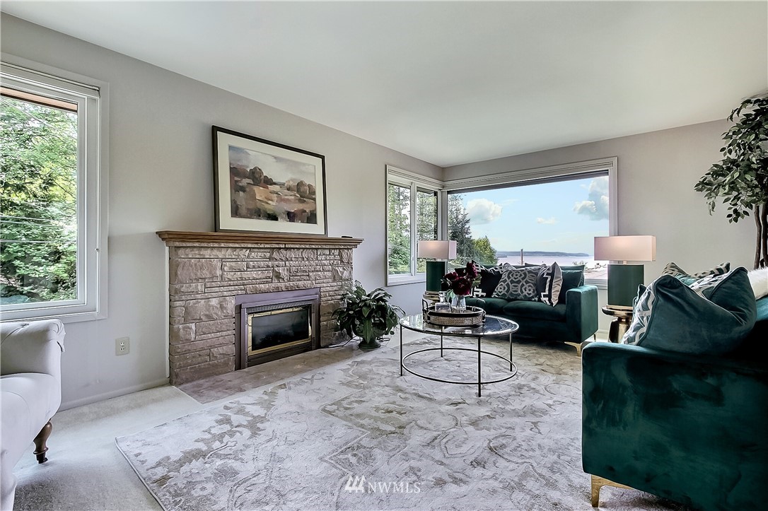 4032 Southwest Myrtle Street Seattle, WA 98136 - Photo 12 of 23 a living room with furniture and a fireplace