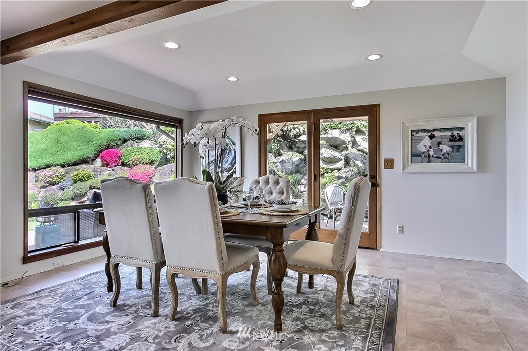 4032 Southwest Myrtle Street Seattle, WA 98136 - Photo 10 of 23 a view of a dining room with furniture window and outside view
