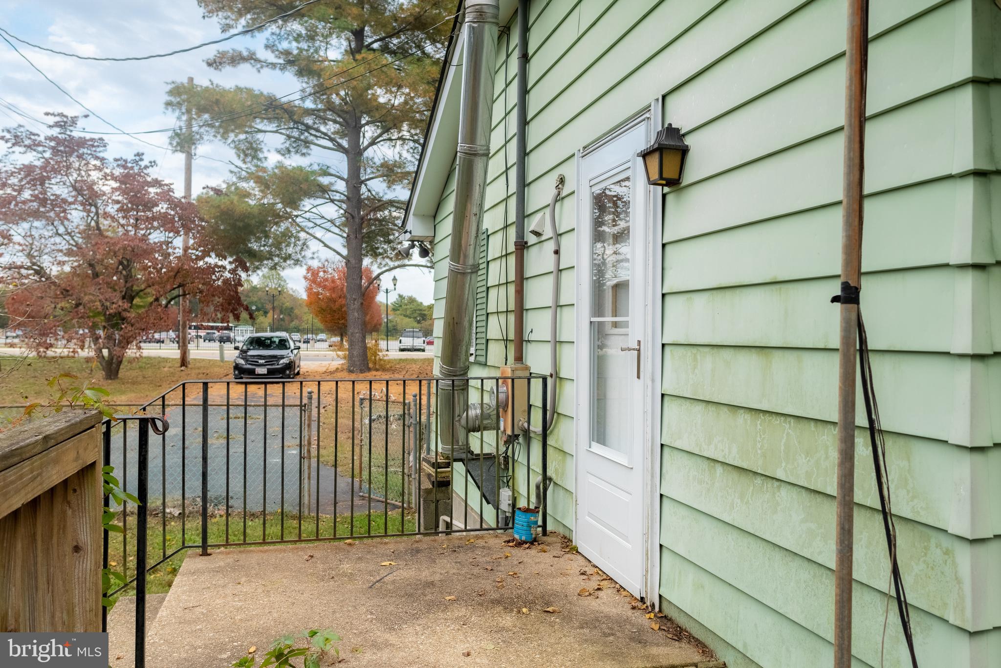 165 Fairground Road Prince Frederick, MD 20678 - Photo 22 of 27 a balcony view with iron fence