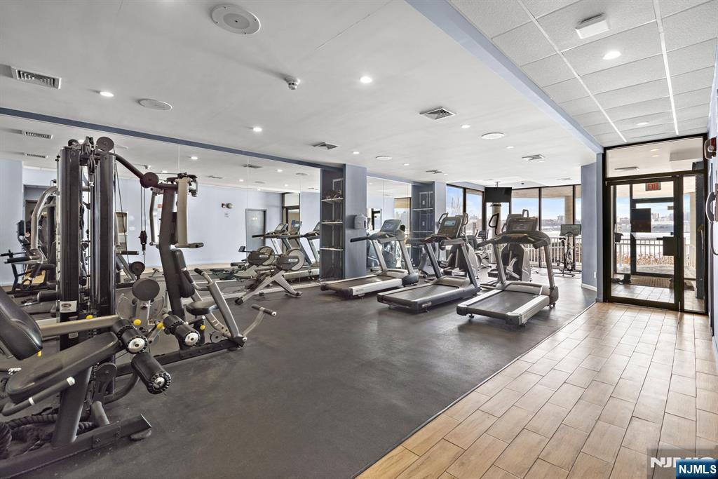 1055 River Road, Unit PH 8 Edgewater, NJ 07020 - Photo 24 of 30 a view of a room with gym equipment