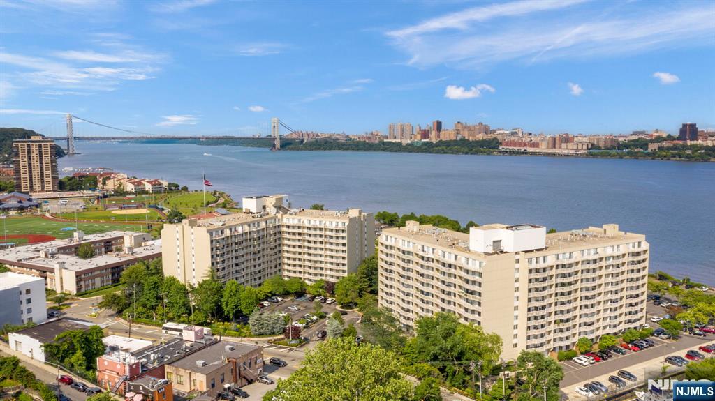 1055 River Road, Unit PH 8 Edgewater, NJ 07020 - Photo 29 of 30 a view of a city with ocean