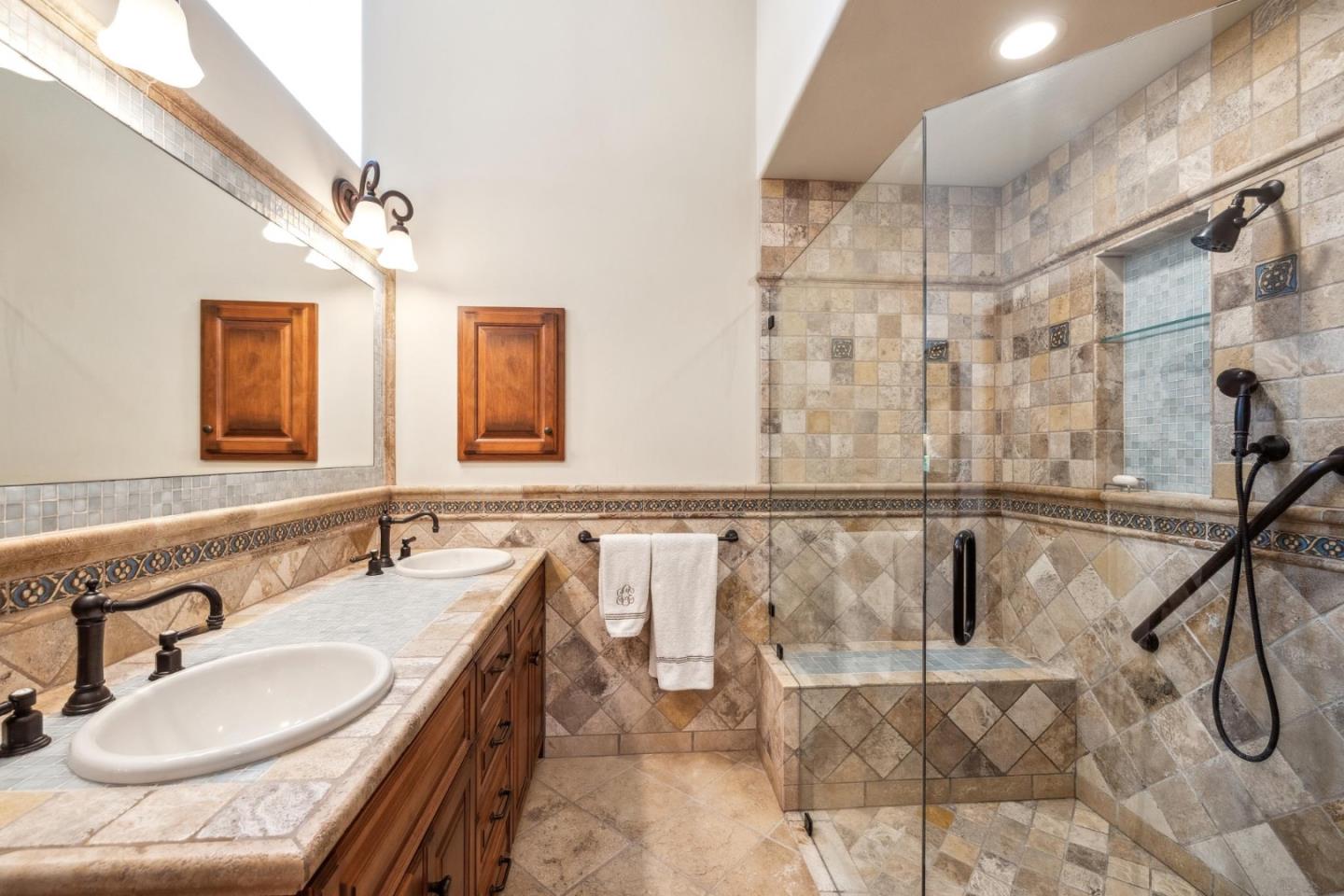 9546 Maple Court Carmel, CA 93923 - Photo 11 of 36 a bathroom with a sink and a mirror