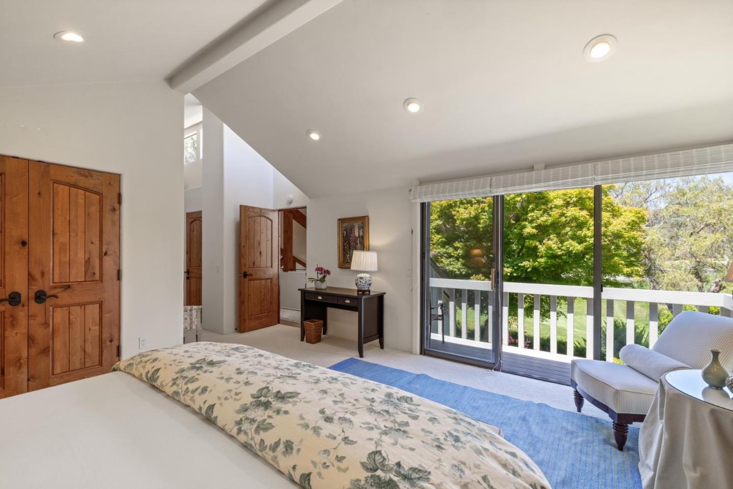 9546 Maple Court Carmel, CA 93923 - Photo 20 of 36 a bedroom with a bed and a large window