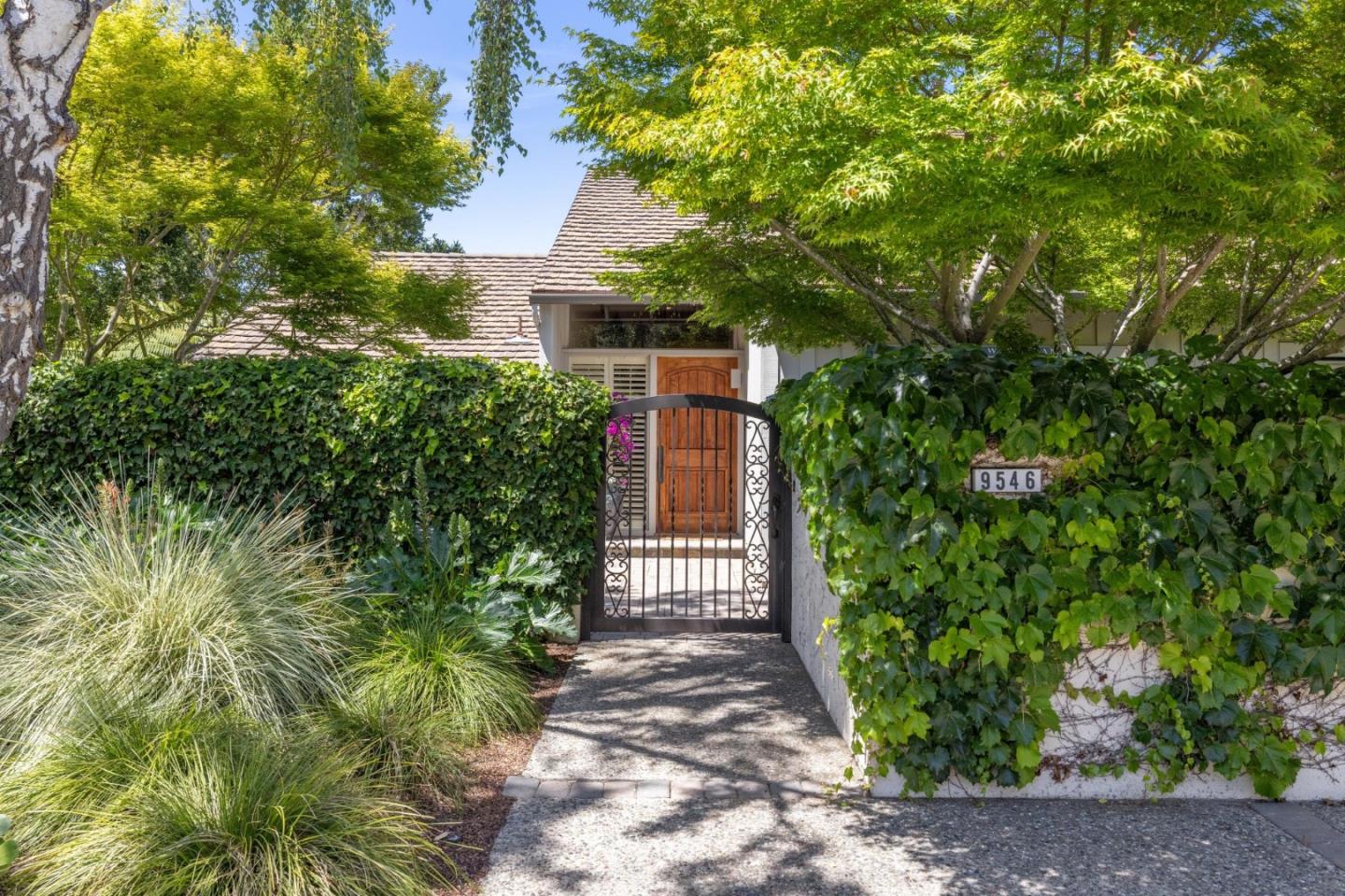 9546 Maple Court Carmel, CA 93923 - Photo 2 of 36 a front view of a house with a yard