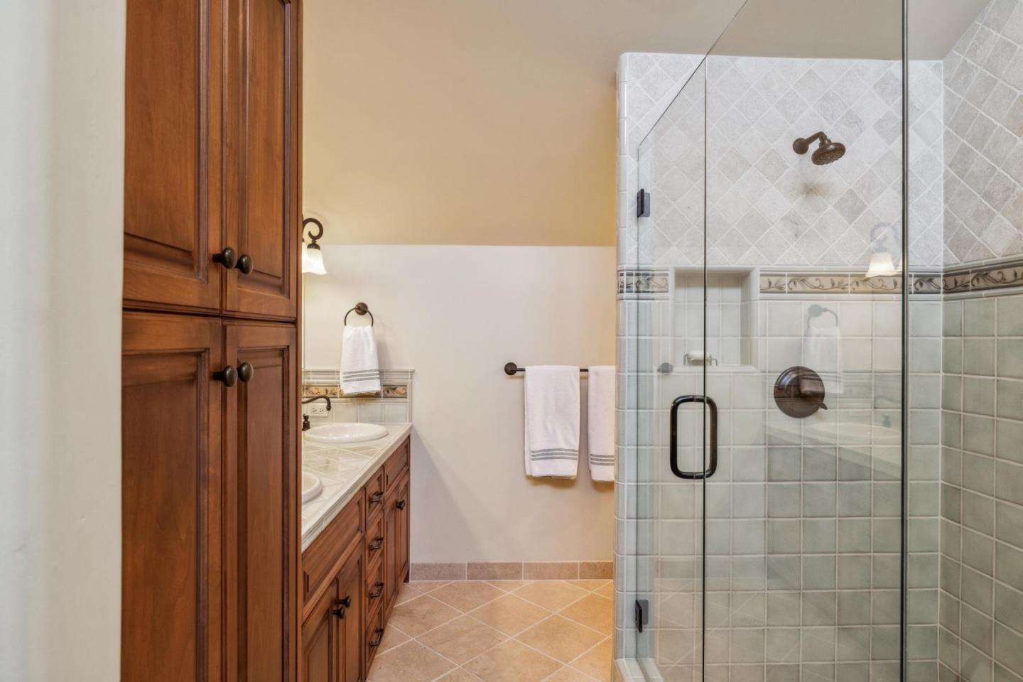 9546 Maple Court Carmel, CA 93923 - Photo 22 of 36 a bathroom with a tub and shower