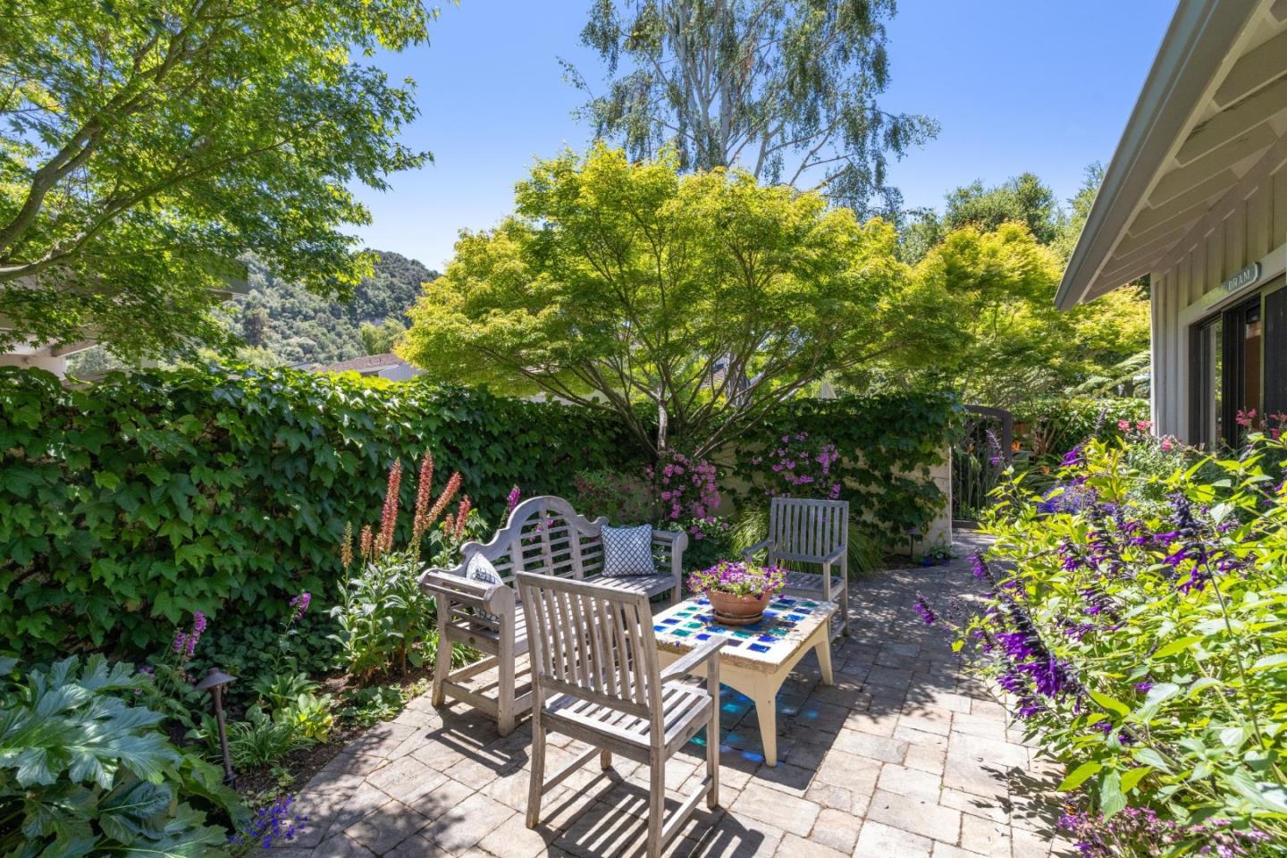 9546 Maple Court Carmel, CA 93923 - Photo 27 of 36 a view of backyard with sitting area and garden