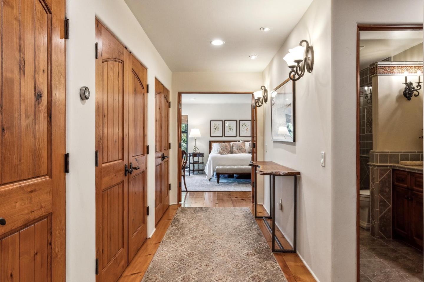 9546 Maple Court Carmel, CA 93923 - Photo 7 of 36 a view of a hallway with a livingroom and a bathroom