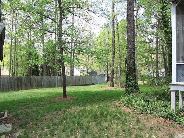 5312 McCormick Road Durham, NC 27713 - Photo 10 of 12 View from extra pading pad into wooded back yard