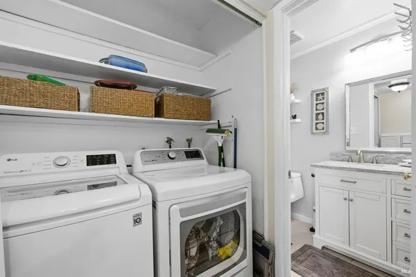a utility room with dryer and washer