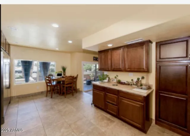 a kitchen with a sink and cabinets