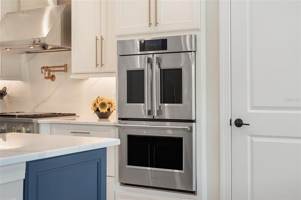 10175 Brocksport Circle Gotha, FL 34734 - Photo 13 of 54 a kitchen with appliances and cabinets