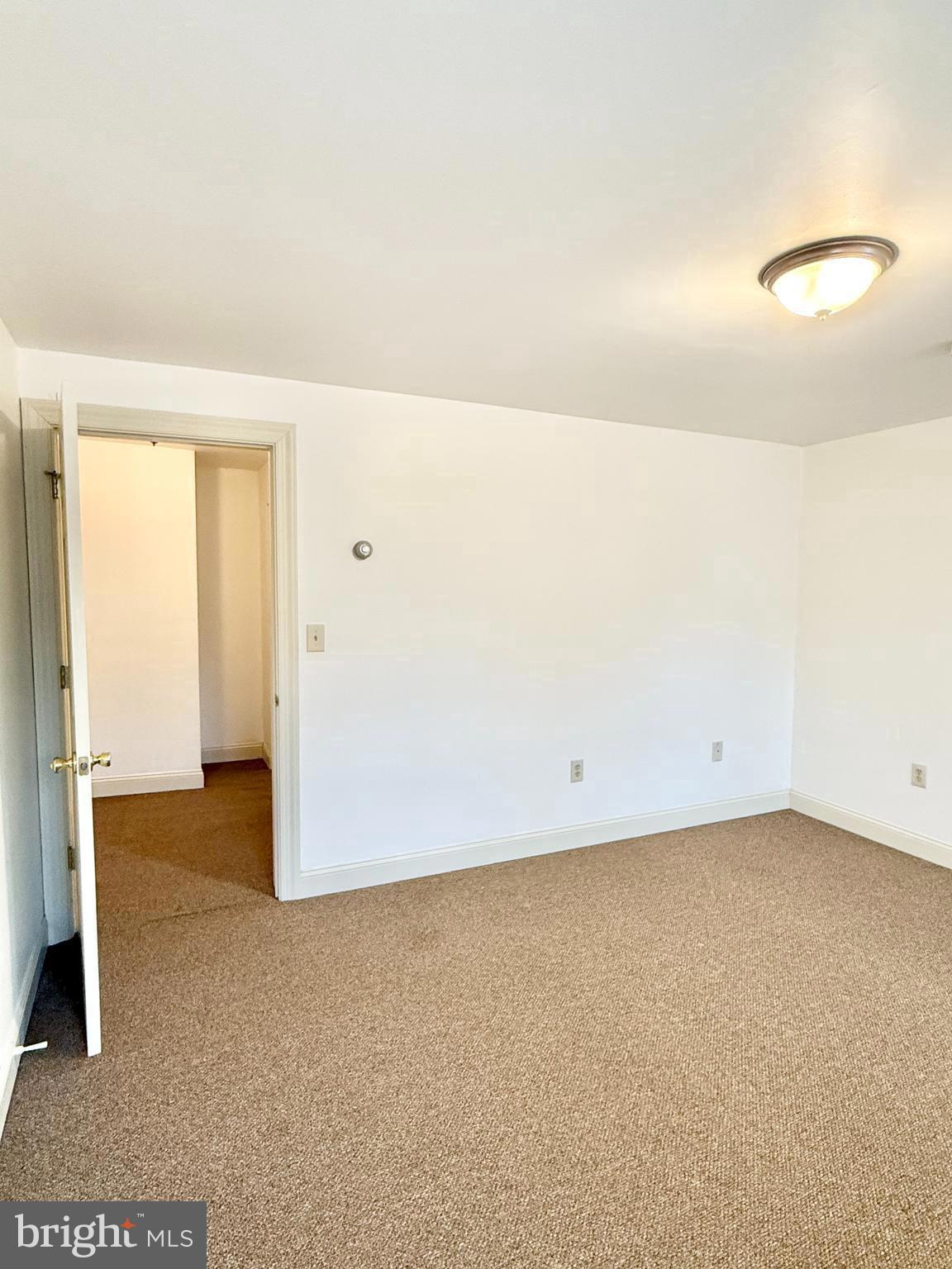 26 North Main Street Spring City, PA 19475 - Photo 7 of 12 an empty room with a door