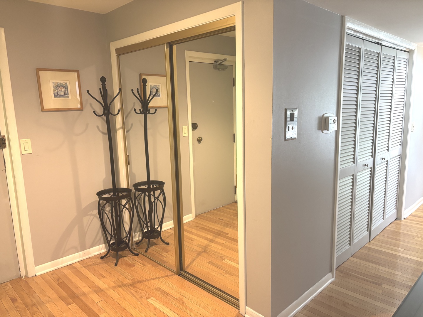 1847 Tanglewood Drive, Unit 3B Glenview, IL 60025 - Photo 27 of 30 a view of a hallway with furniture and front door