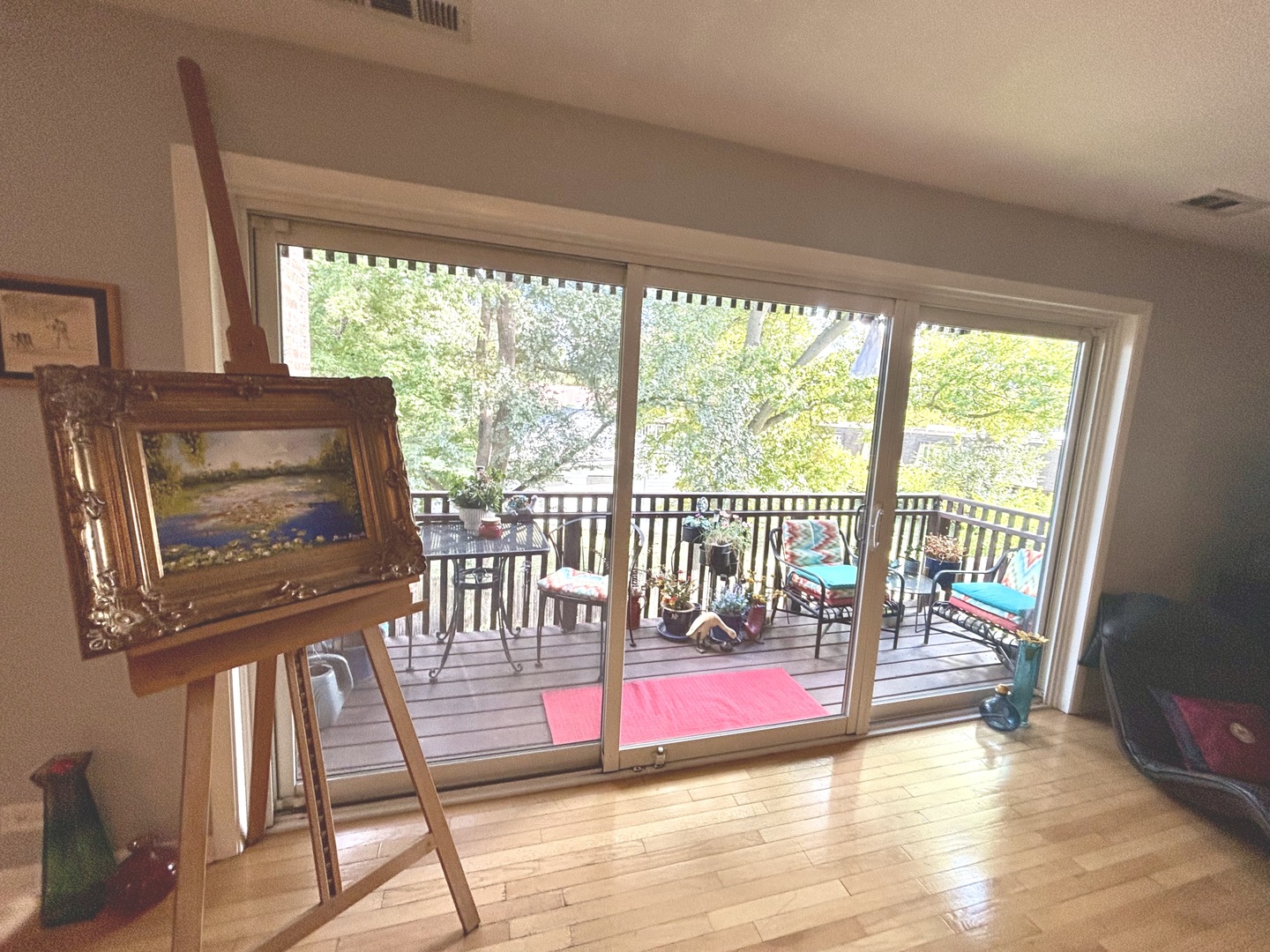1847 Tanglewood Drive, Unit 3B Glenview, IL 60025 - Photo 4 of 30 a view of a porch with wooden floor and outdoor space