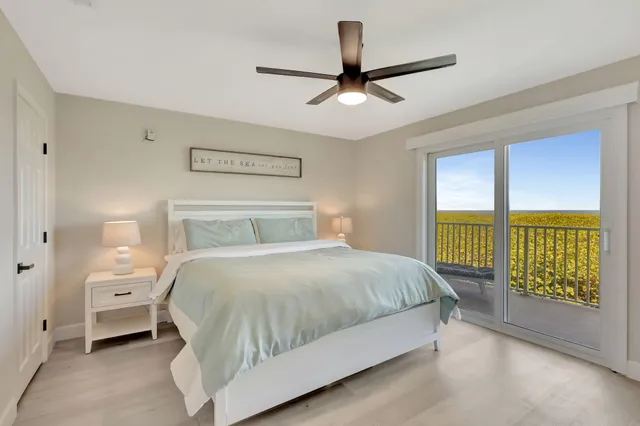 a bathroom with a sink toilet a mirror and shower