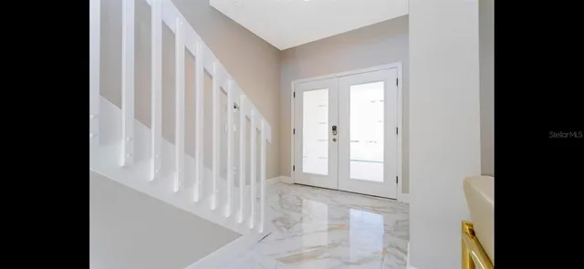 a view of an entryway with staircase