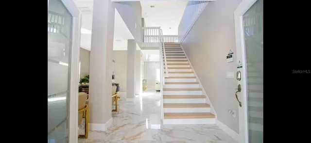 a view of an entryway with staircase