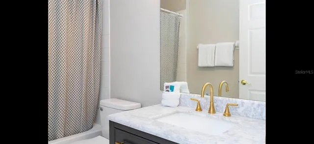 a workspace with furniture and window