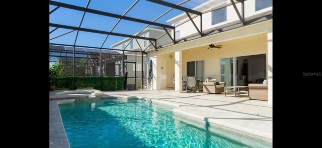 a bathroom with a walk in closet and a fireplace
