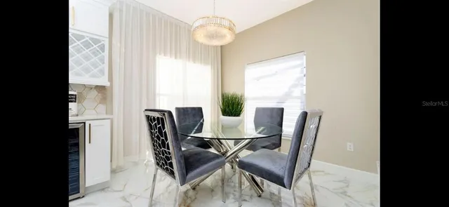 a balcony with furniture and a garden