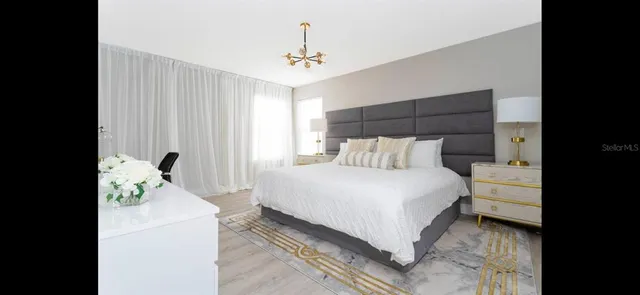 a view of balcony with furniture