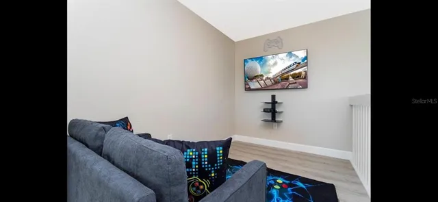 a living room with furniture and a couch