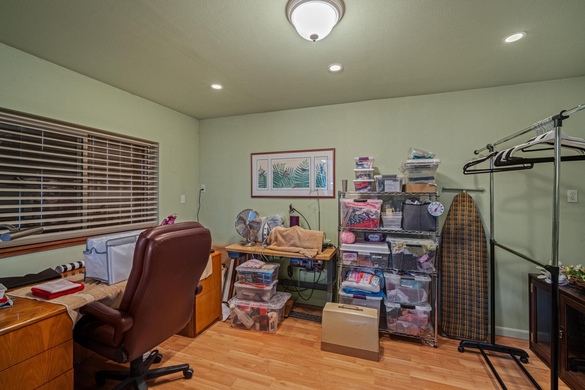 56019 Snow Goose Road Bend, OR 97707 - Photo 29 of 32 a view of a workspace with furniture and a window