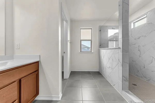 a view of an empty walk in closet