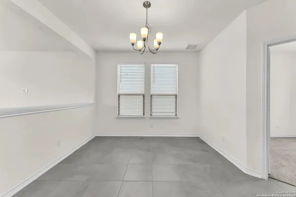 a view of an empty room with window