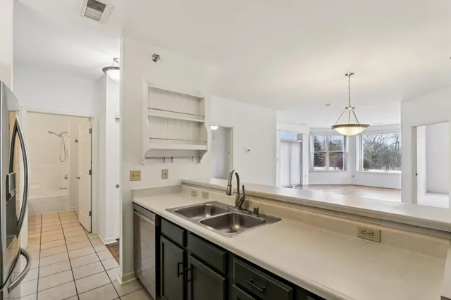 $239,000 | 6995 South Riverwood Boulevard, Unit A05, Franklin, WI 53132