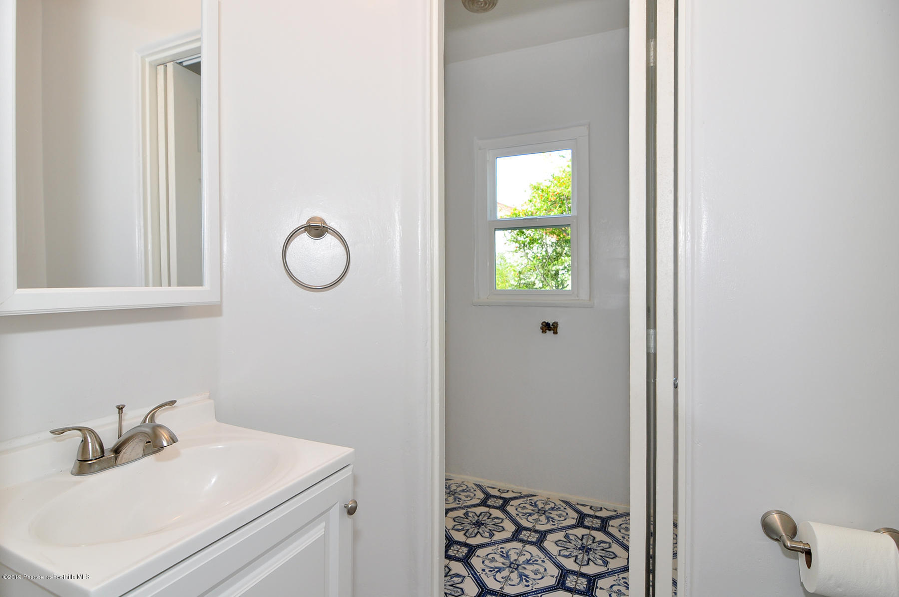2011 Minoru Drive Altadena, CA 91001 - Photo 14 of 33 a bathroom with a sink and a mirror
