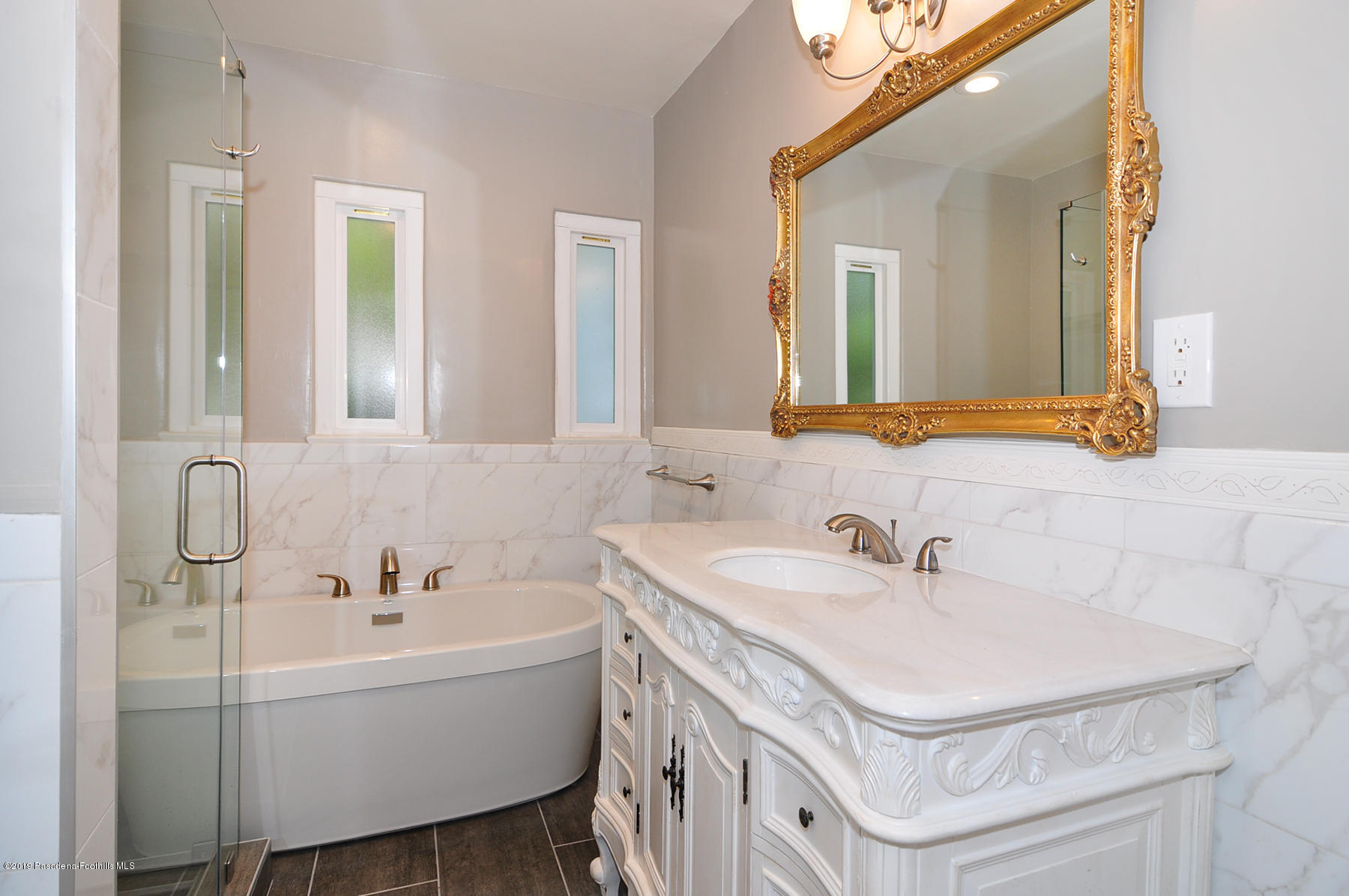 2011 Minoru Drive Altadena, CA 91001 - Photo 18 of 33 a bathroom with a sink and a mirror