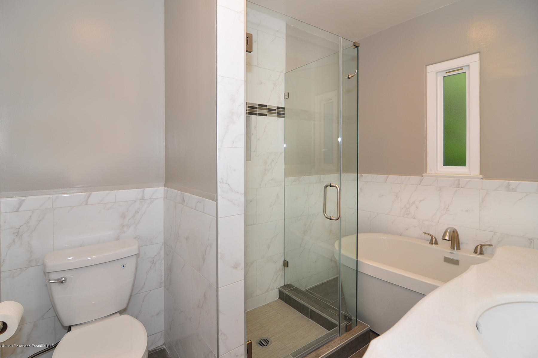 2011 Minoru Drive Altadena, CA 91001 - Photo 19 of 33 a bathroom with a toilet and a bathtub