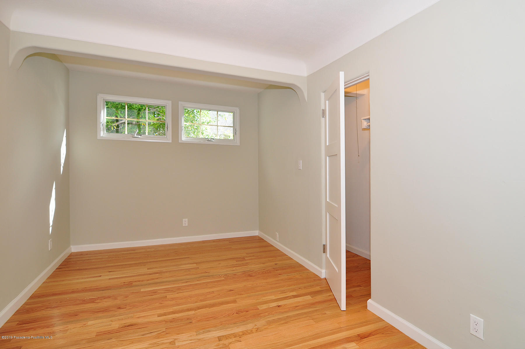 2011 Minoru Drive Altadena, CA 91001 - Photo 20 of 33 a view of an empty room with wooden floor and a window