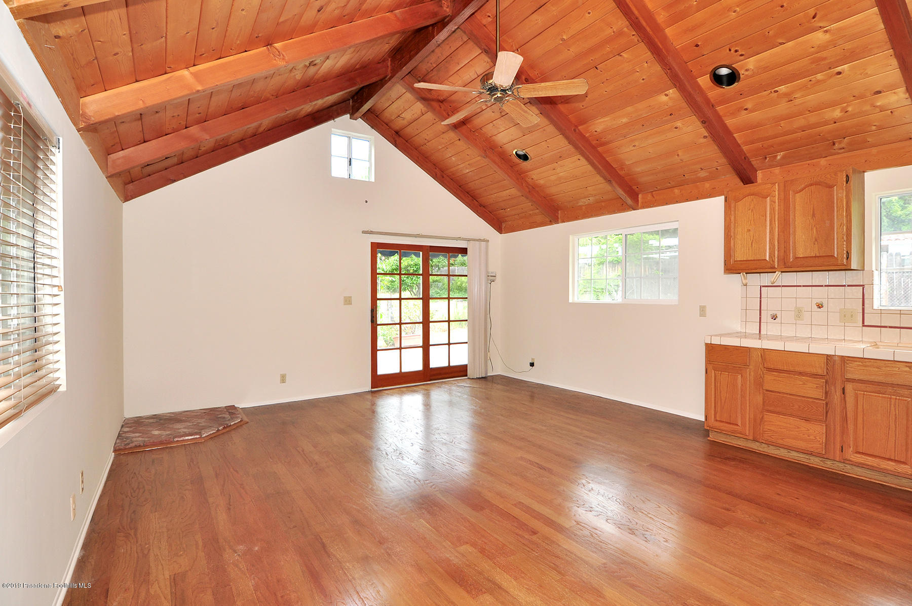 2011 Minoru Drive Altadena, CA 91001 - Photo 26 of 33 a view of an empty room with a window and wooden floor