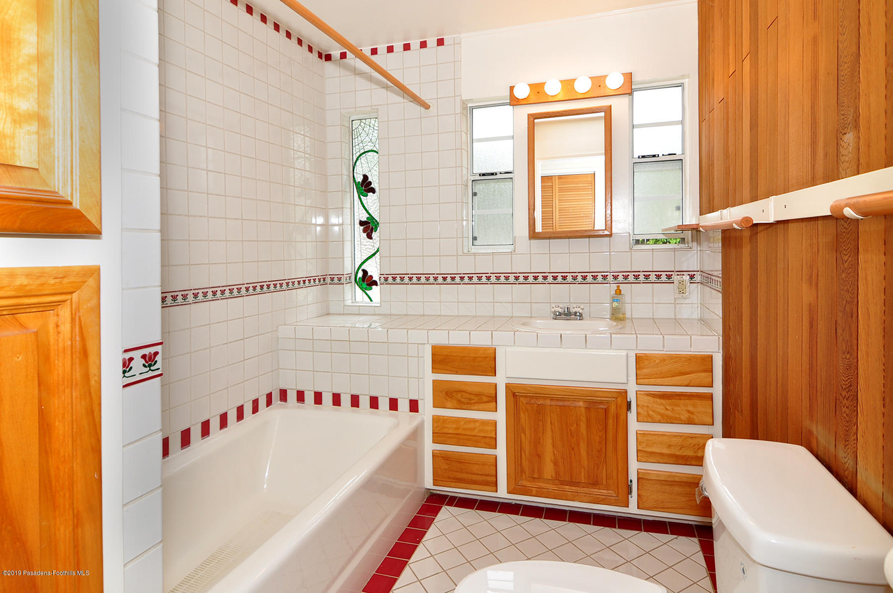 2011 Minoru Drive Altadena, CA 91001 - Photo 28 of 33 a bathroom with a tub and a window