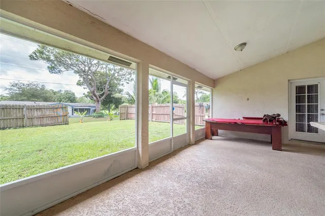 a swimming pool view with a outdoor space